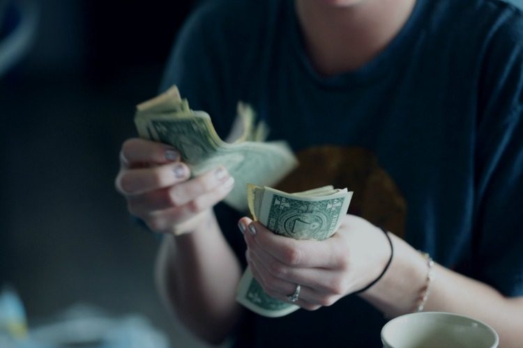 Image of women counting money