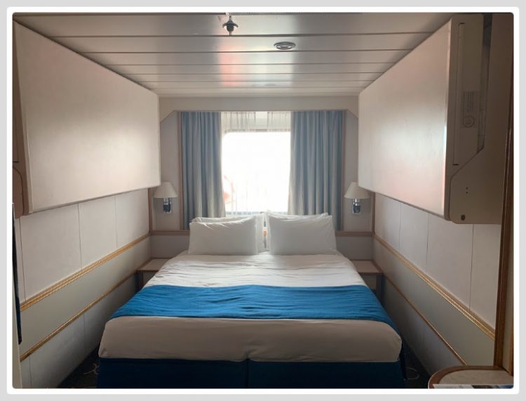 image of ocean view stateroom on Empress of the Seas choosing a cruise stateroom