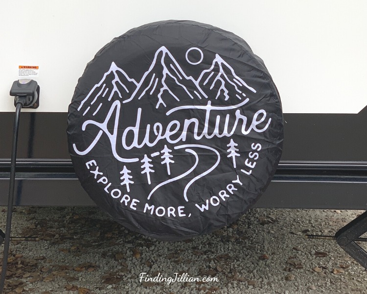 image of wheel cover with word Adventure